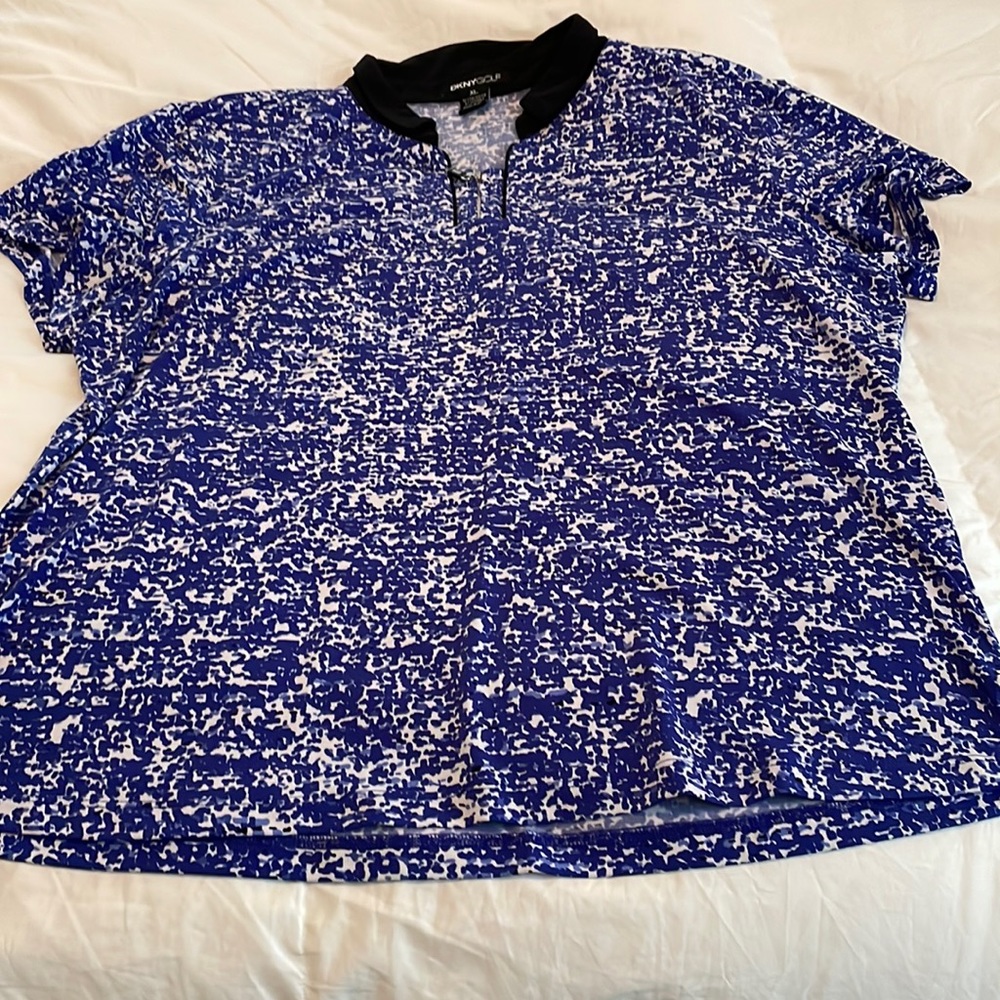 Polo top. DKNYGOLf. Size XL. Blue/white. Excellent condition.
